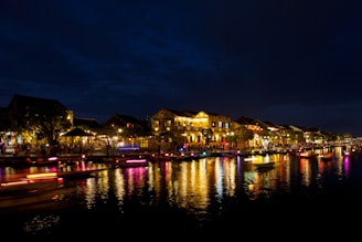 lighted houses near sea