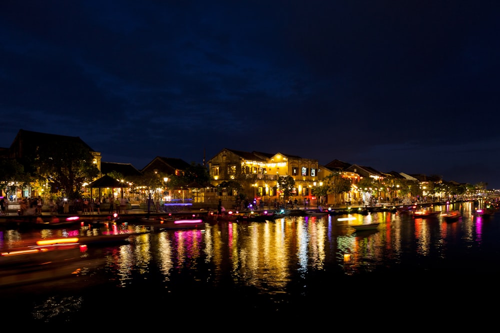 lighted houses near sea