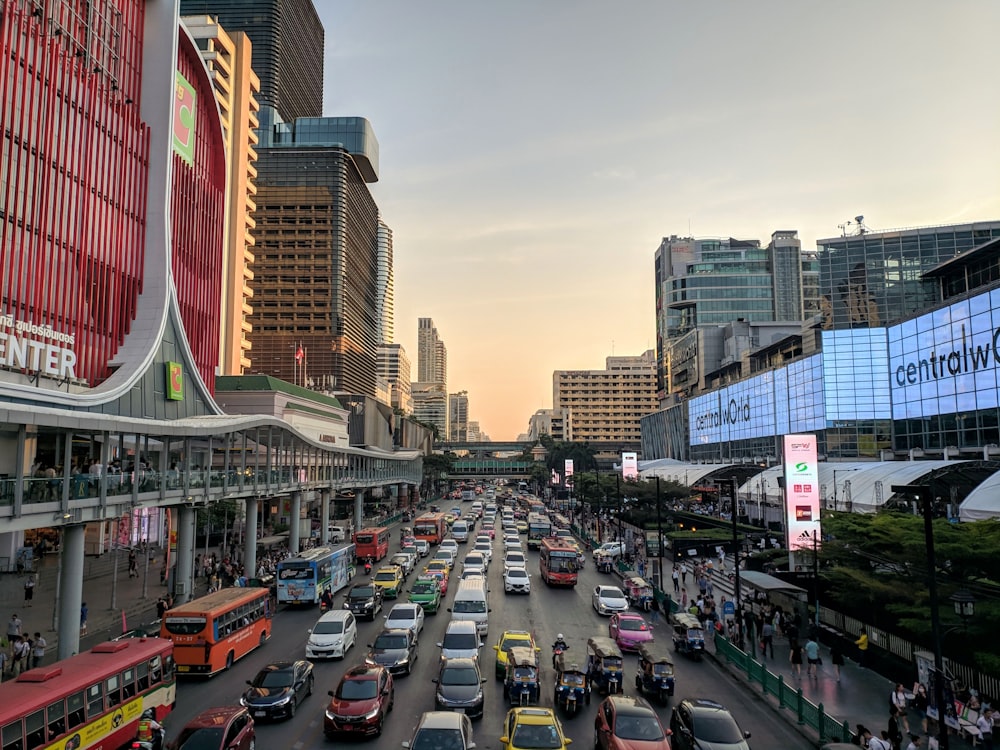 vehicles on road near buildings