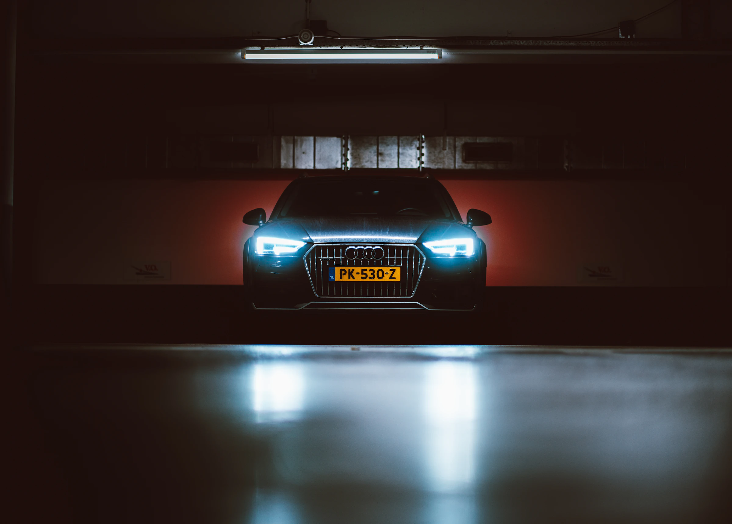 Detailed German sedan in a dark, moody studio
