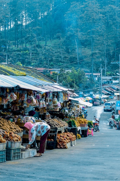 fruits on display beside road during daytime
