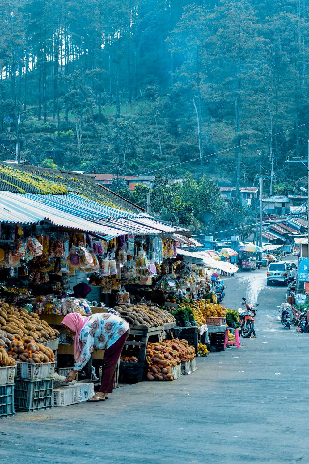 fruits on display beside road during daytime