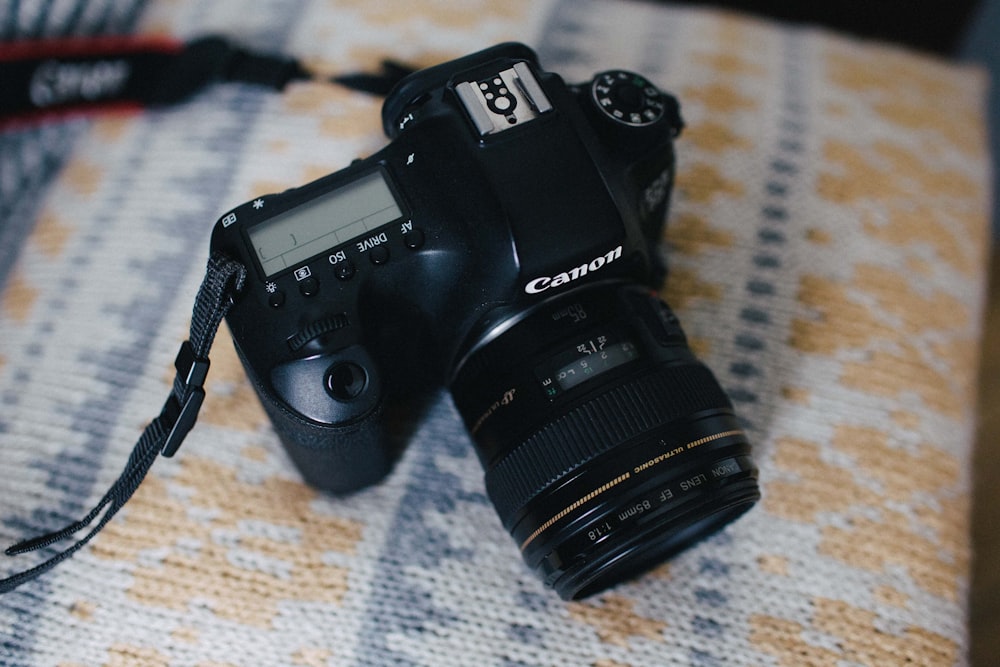 black Canon DSLR camera