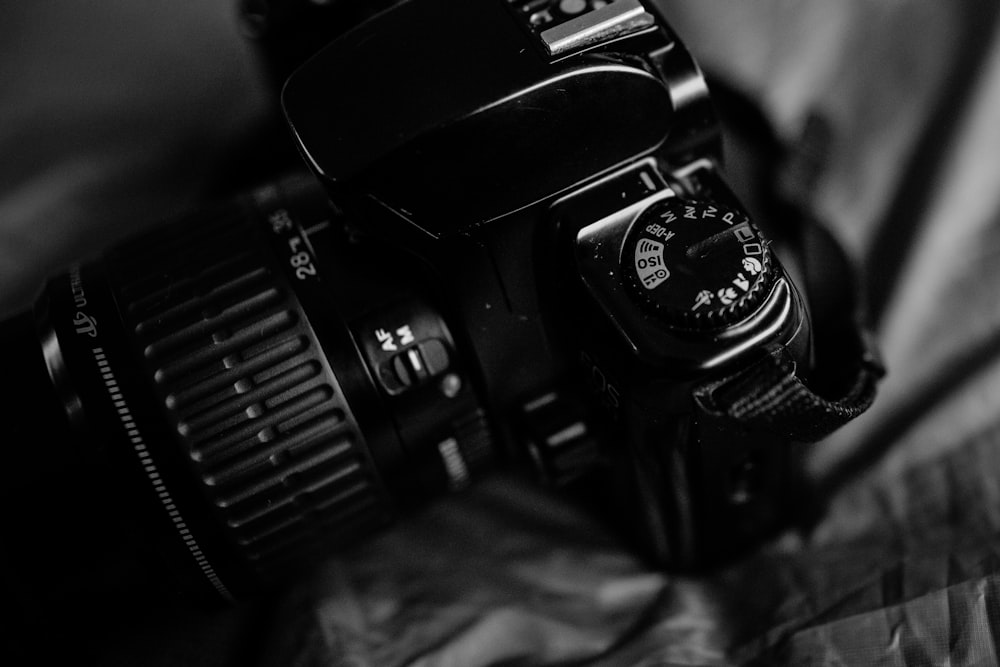 grayscale photo of DSLR camera