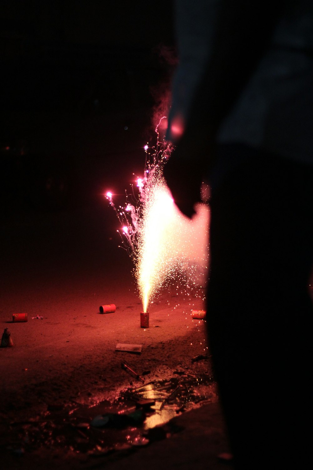 lit fireworks on ground