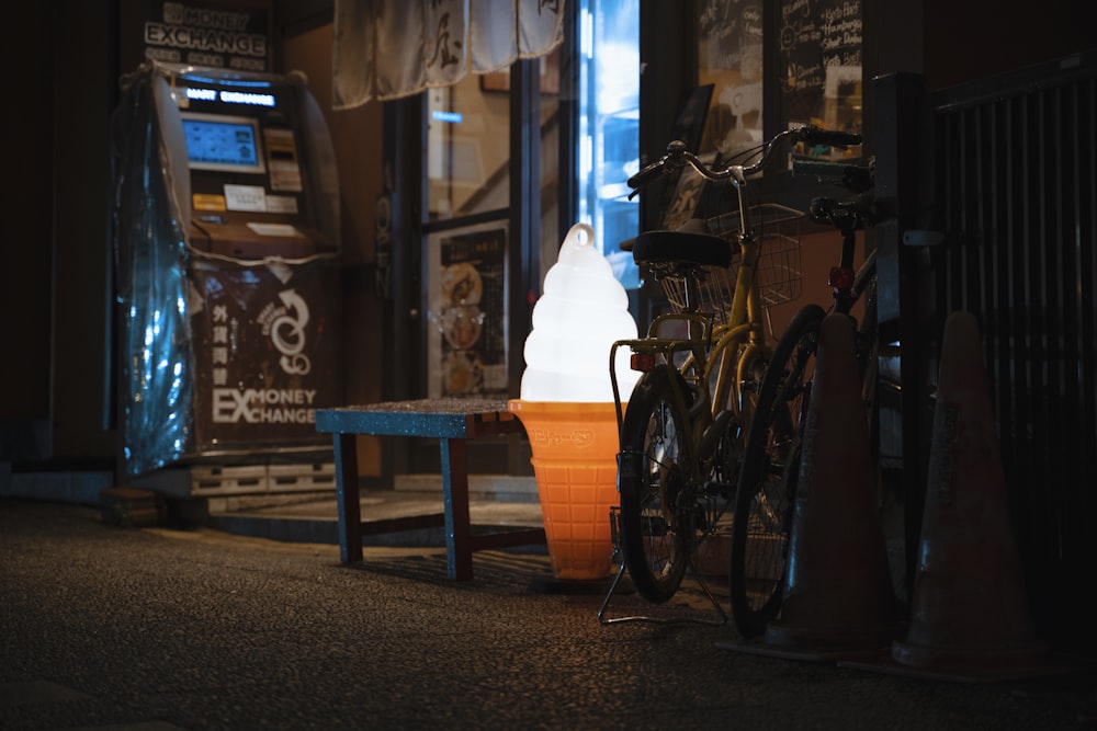 bikes parked near brown table and gray and brown vending machine