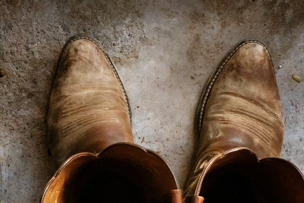 pair of brown leather cowboy boots