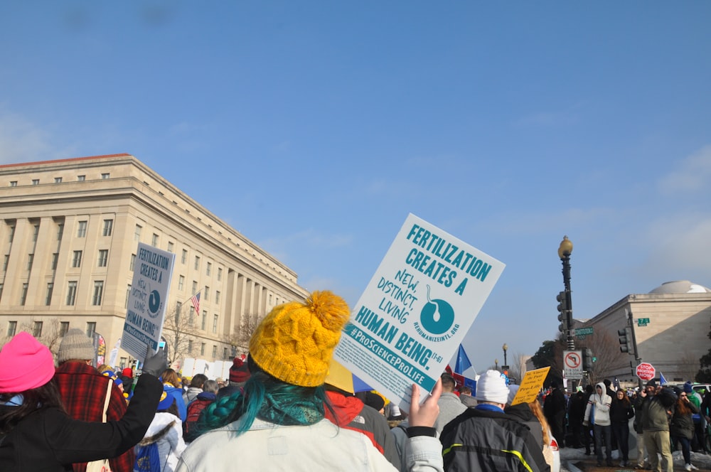 woman holding fertilization creates poster