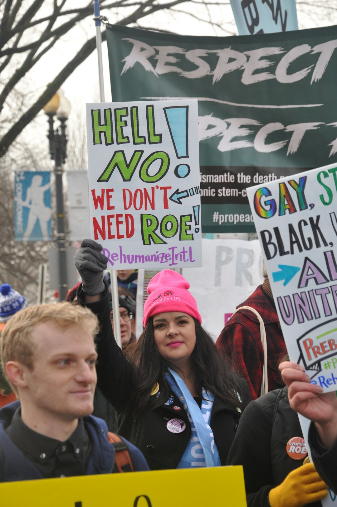 person with signages