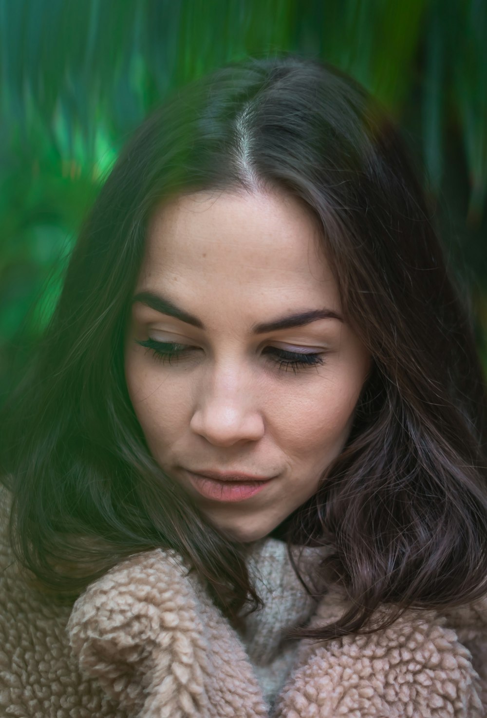 woman wearing brown fur top