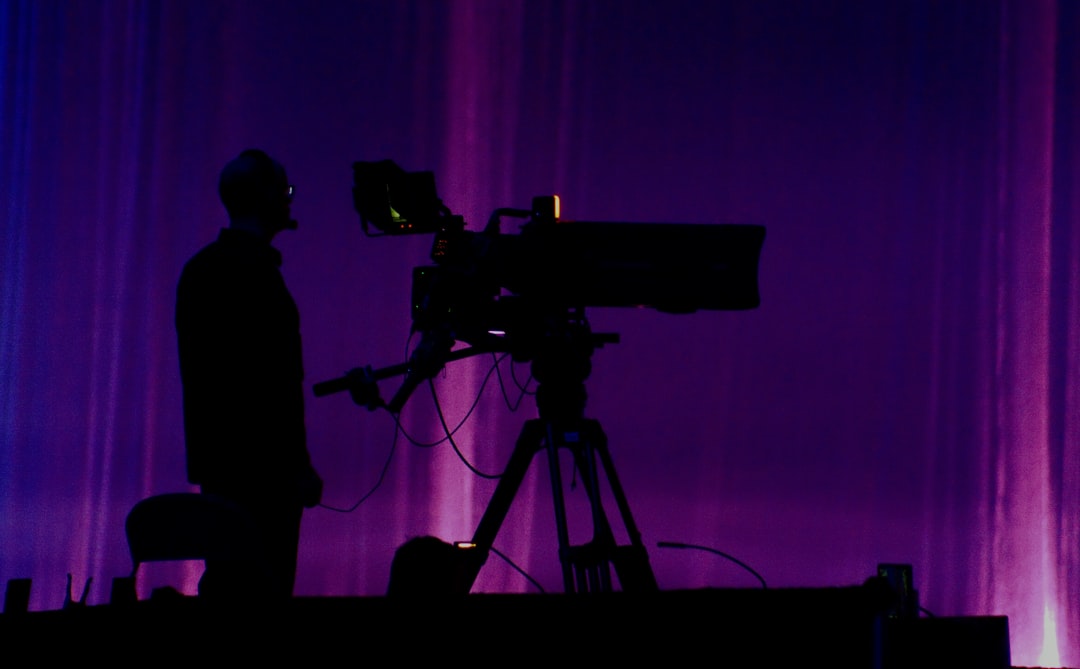 person standing near studio camera