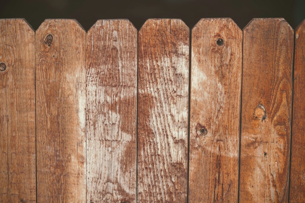 Stained wood picket fence detail