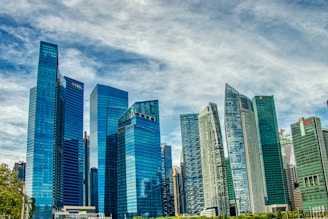 city buildings under cloudy sky