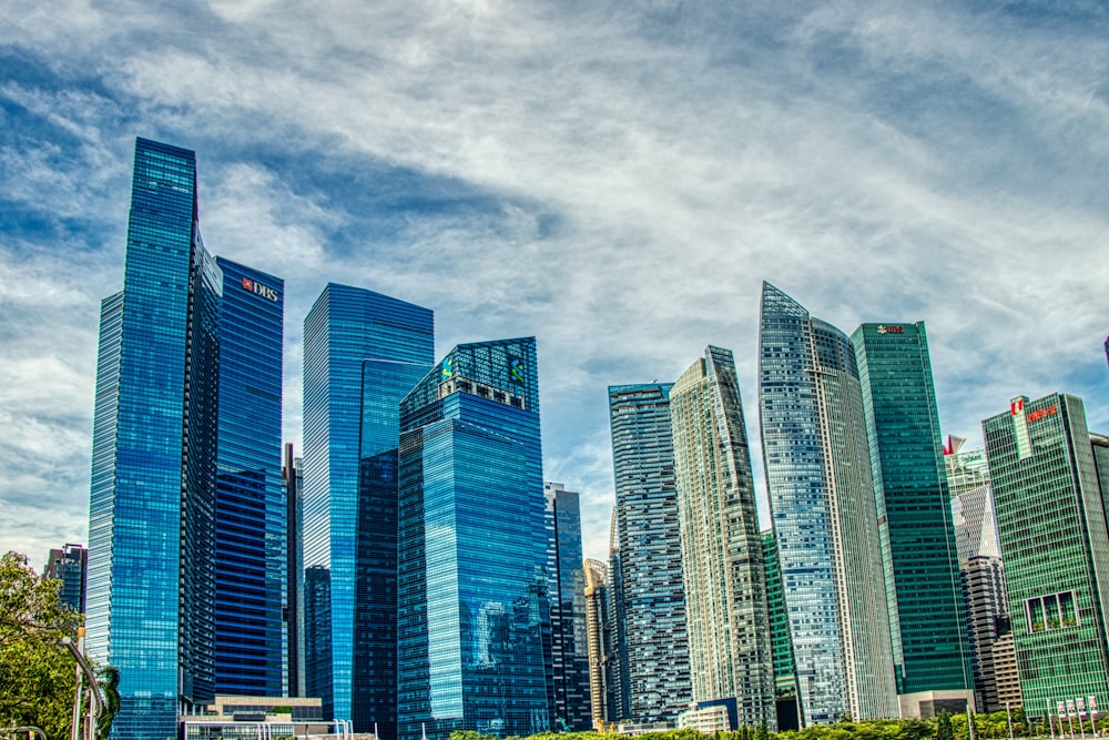 city buildings under cloudy sky