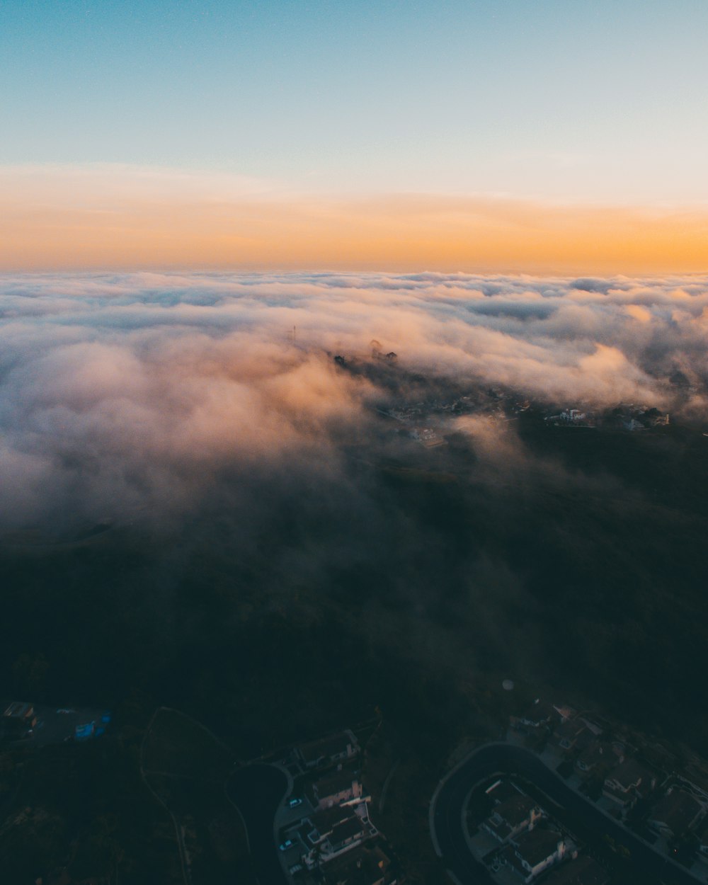 white thick clouds cover the city