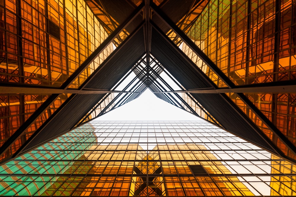 low angle photography of glass buildings