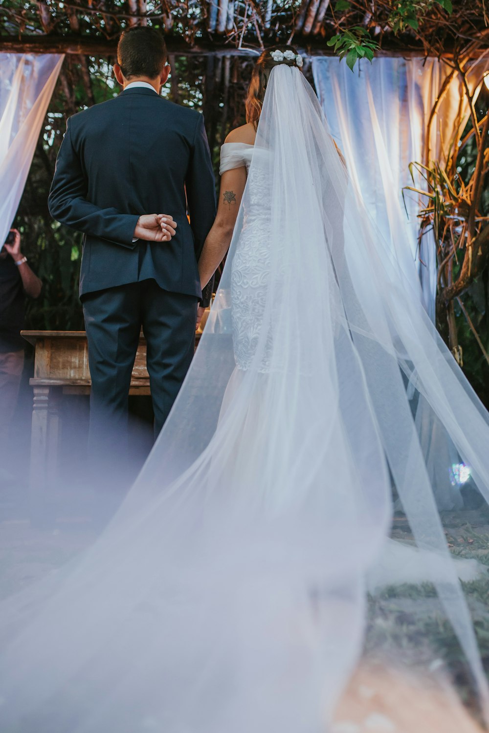 man standing beside woman