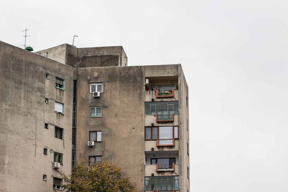 grey concrete building under white sky