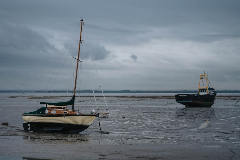 two brown boats on water