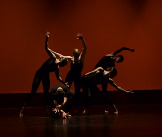 group of people performing on stage