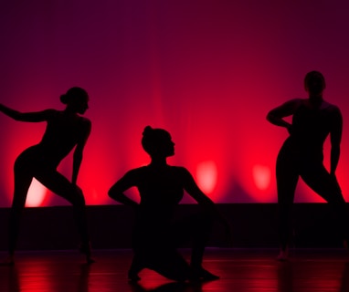 silhouette of people dancing