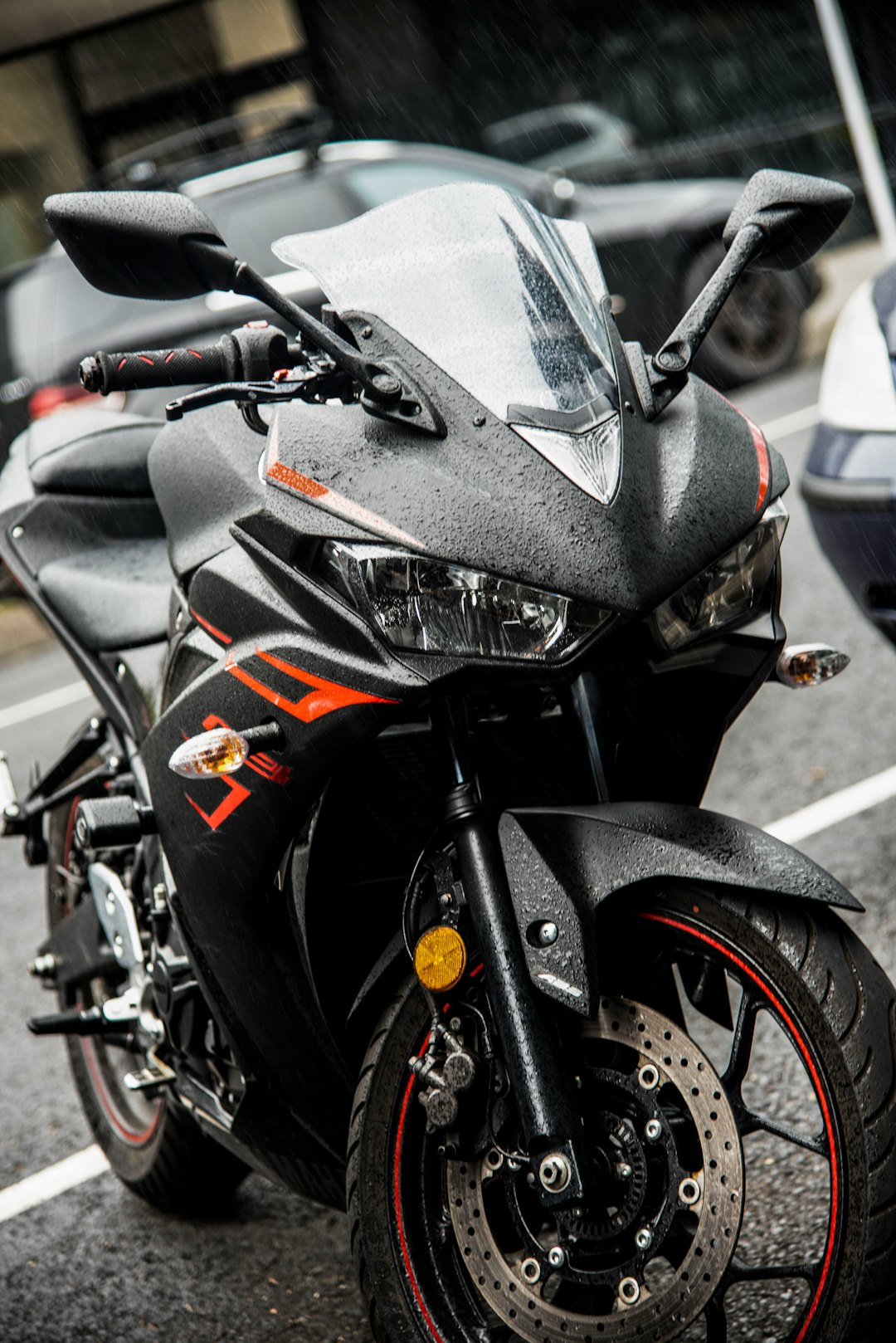 parked black sports bike