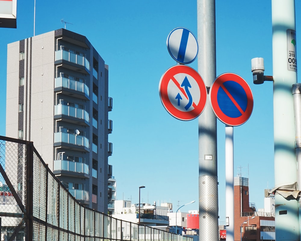 round white-and-blue signages