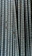 Close-up of strong steel rods bundled together at a construction site.