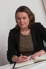 A counselor helping a student craft a standout personal statement.