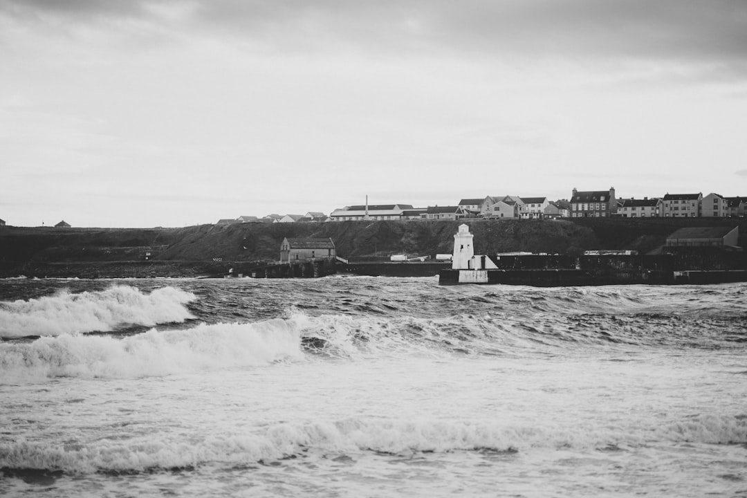 sea waves near buildings