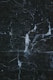 a close up of a black marble surface