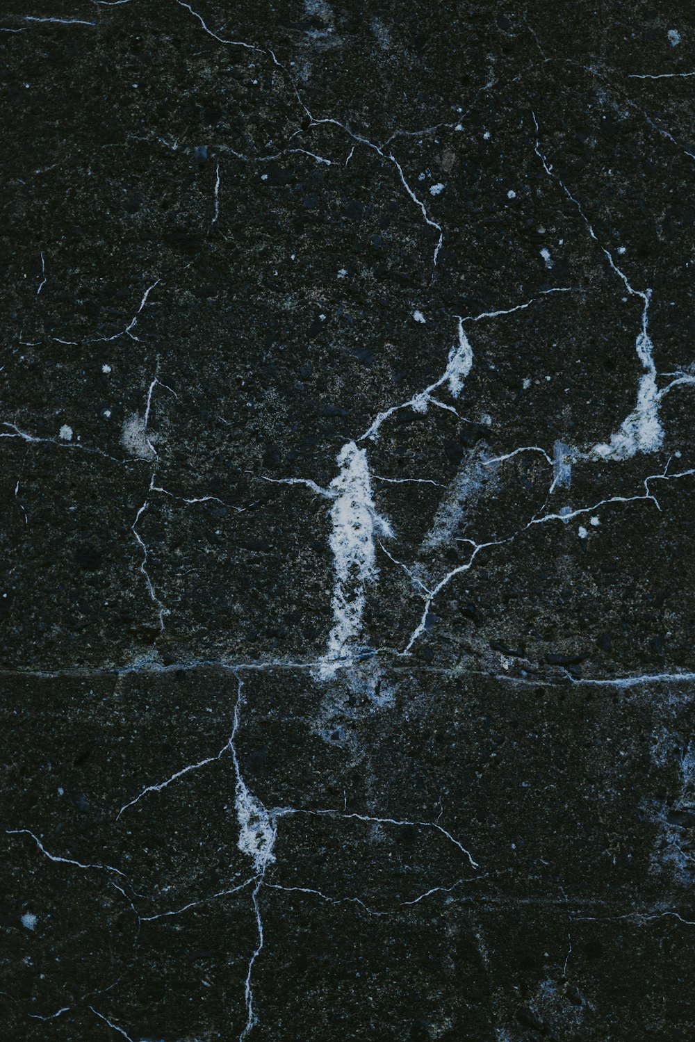 a close up of a black marble surface