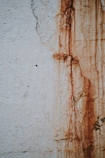 rust coming from white concrete