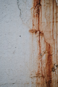 rust coming from white concrete