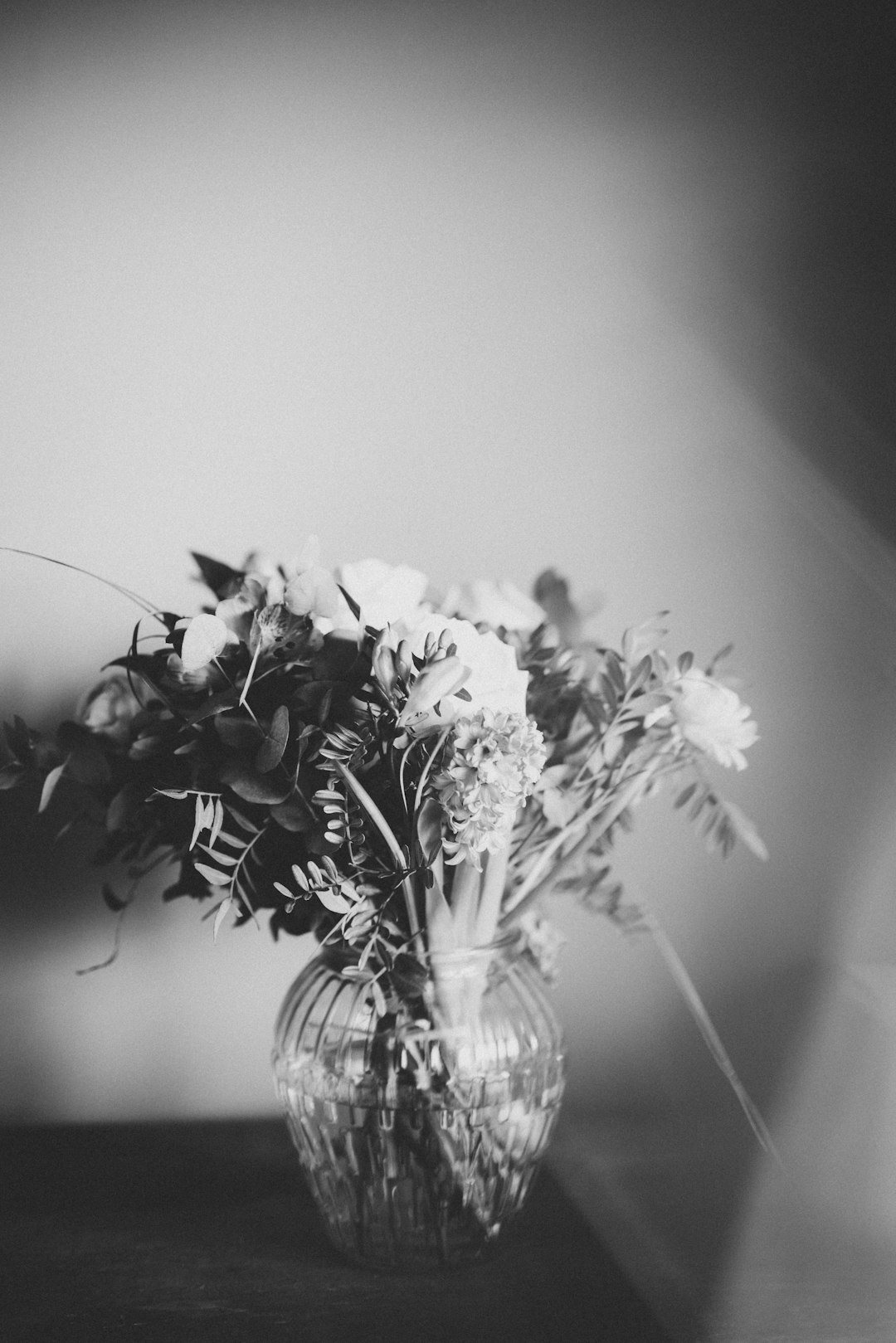 grayscale photo of flower arrangement