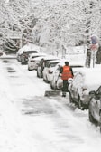 Sidewalk in South Surrey neatly shoveled with snow piled on the sides, showing community care.