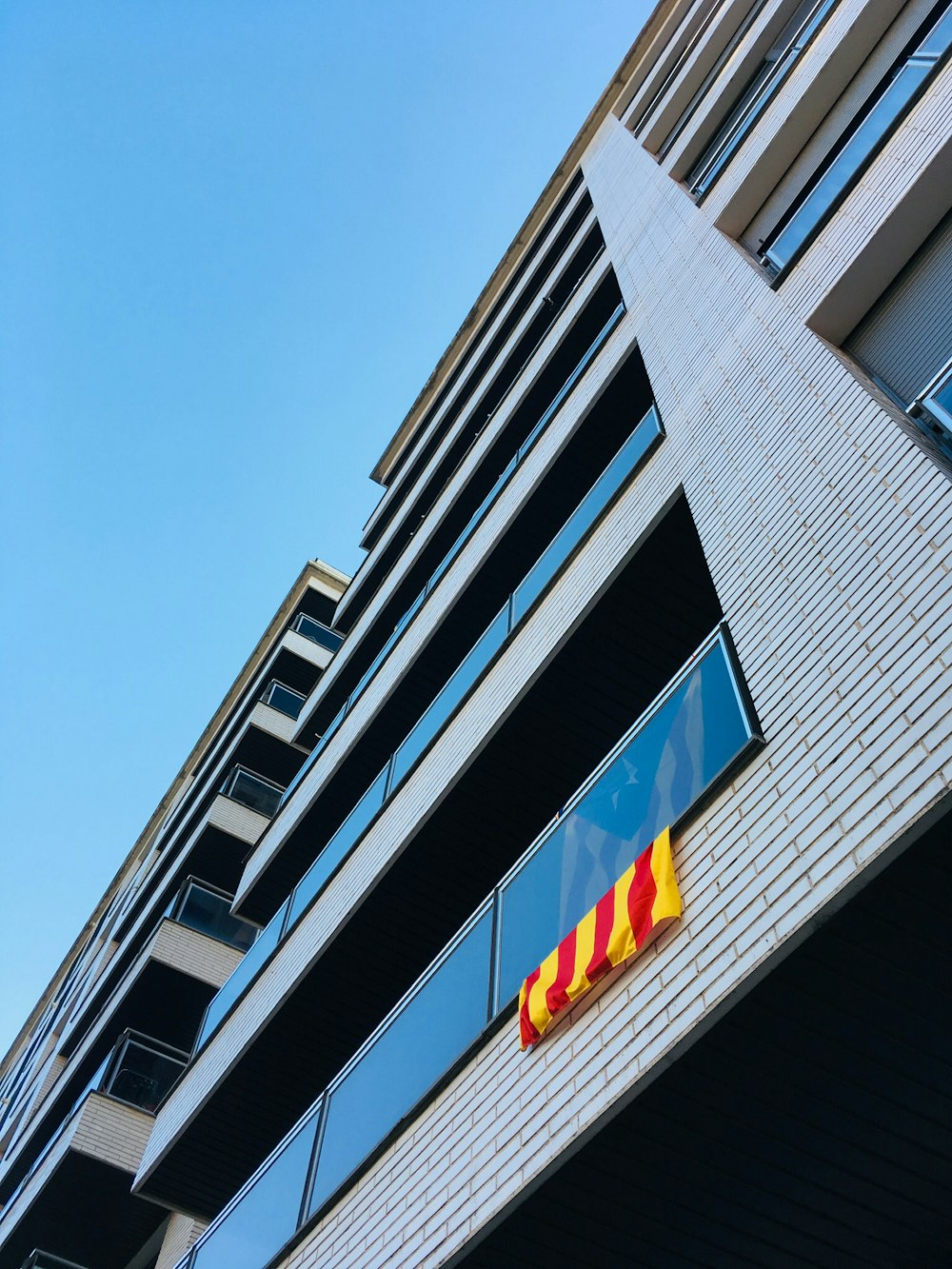 low-angle photography of high-rise building at daytime