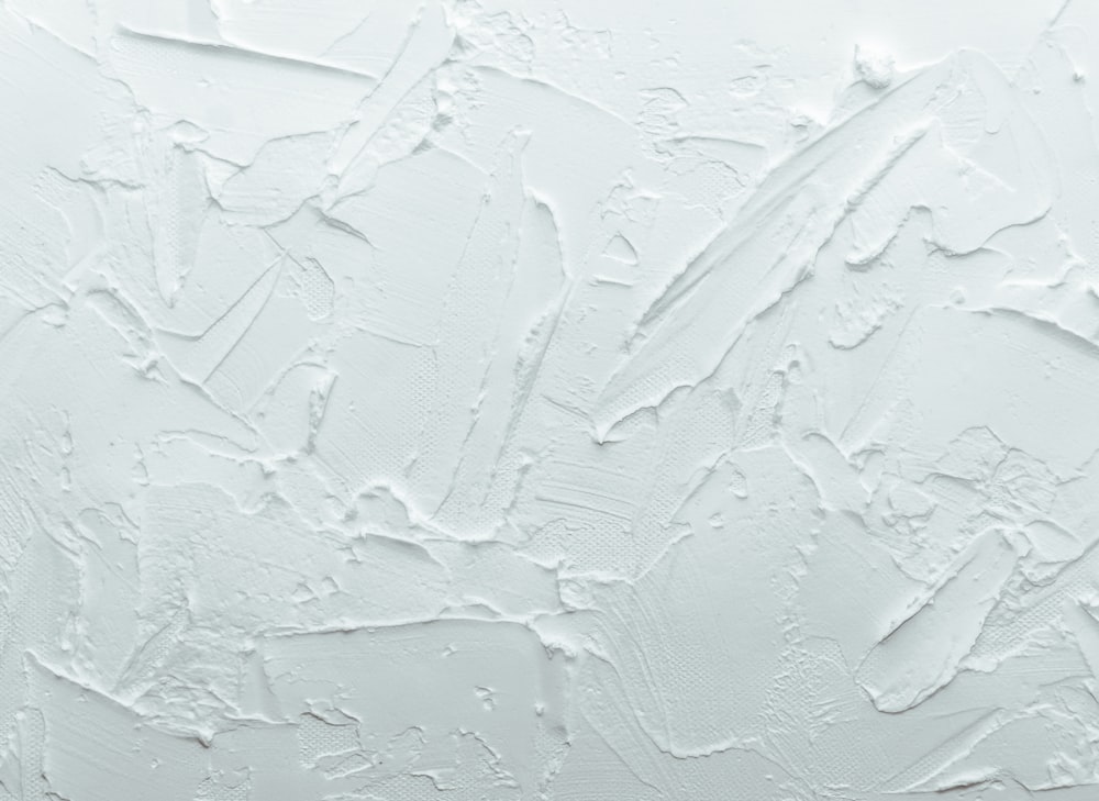 a white wall with some paint on it