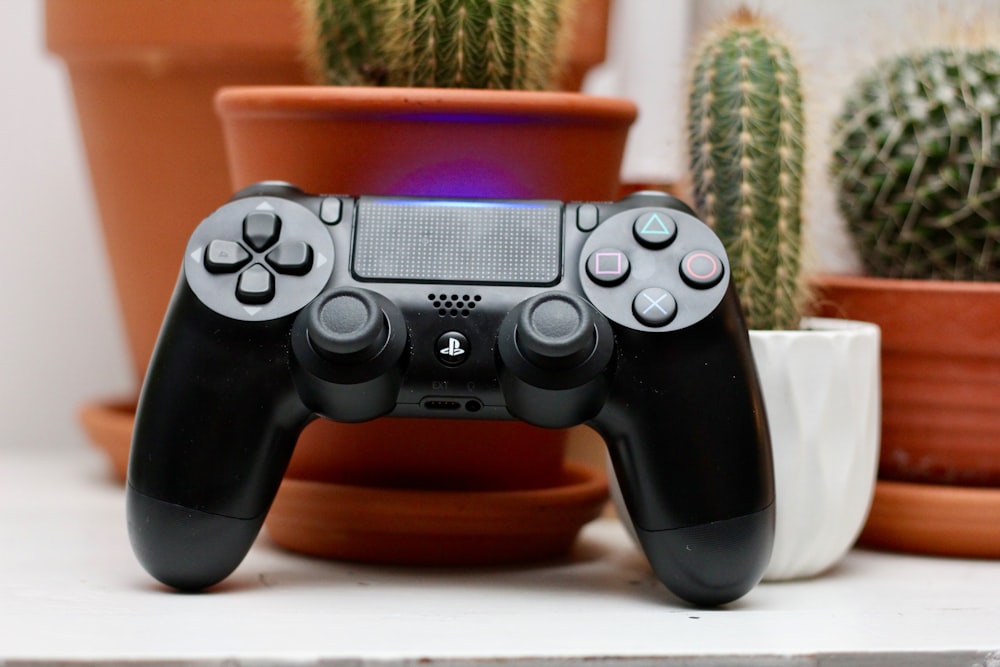 black Sony PS4 wireless controller