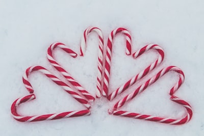 red-and-white candy cane lot candy cane teams background