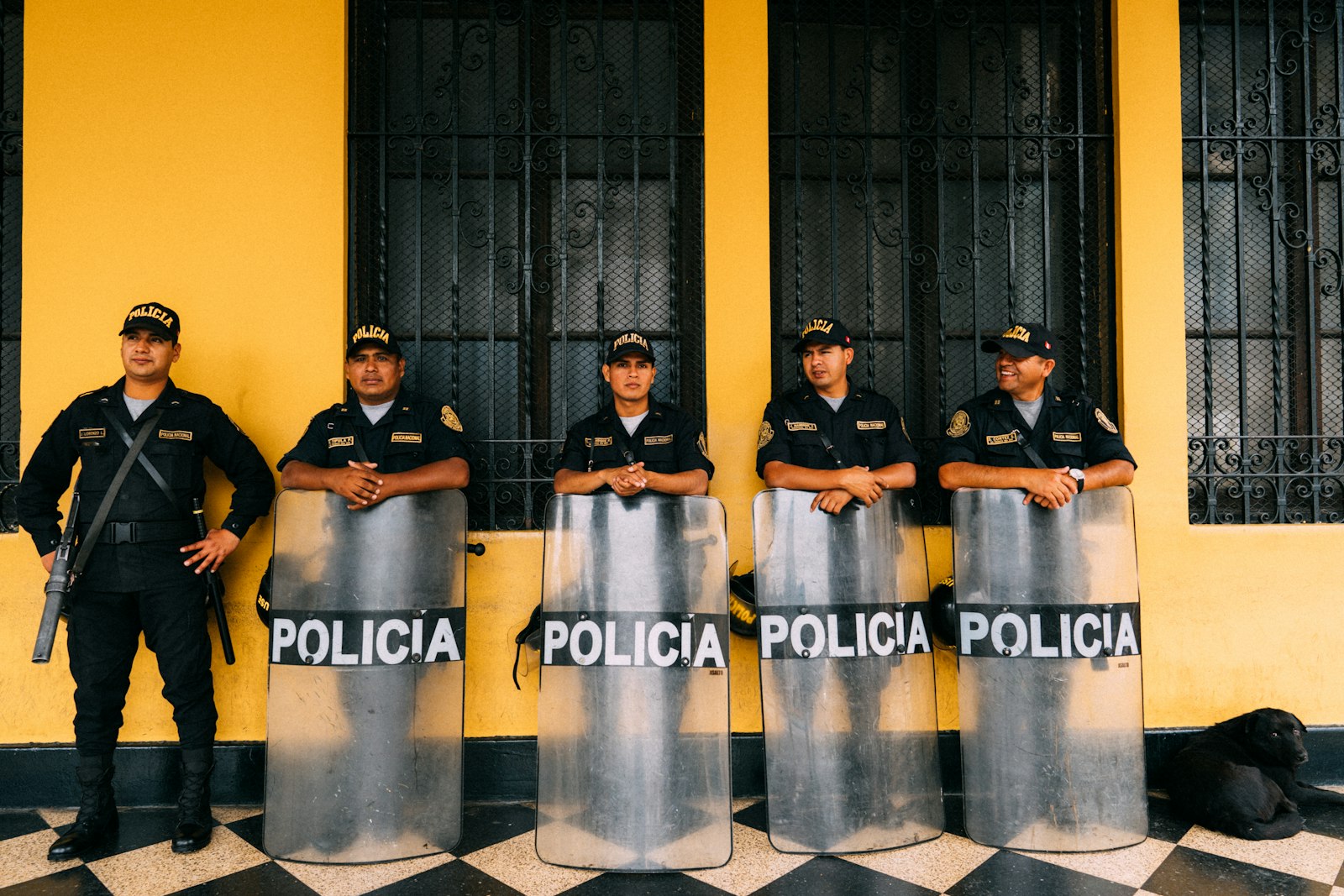 Sony FE 24mm F1.4 GM sample photo. Police man holding windshield photography