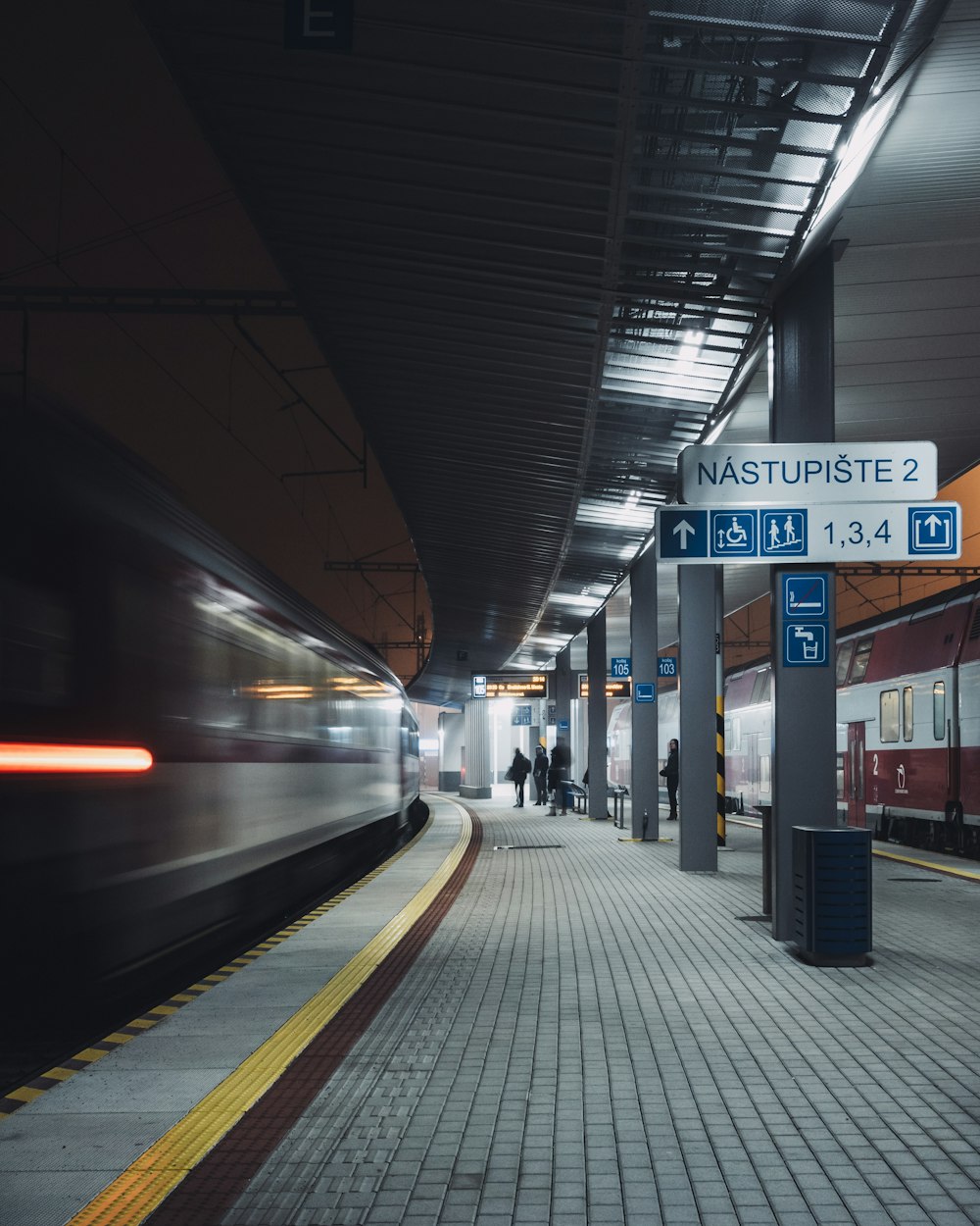 person standing near train