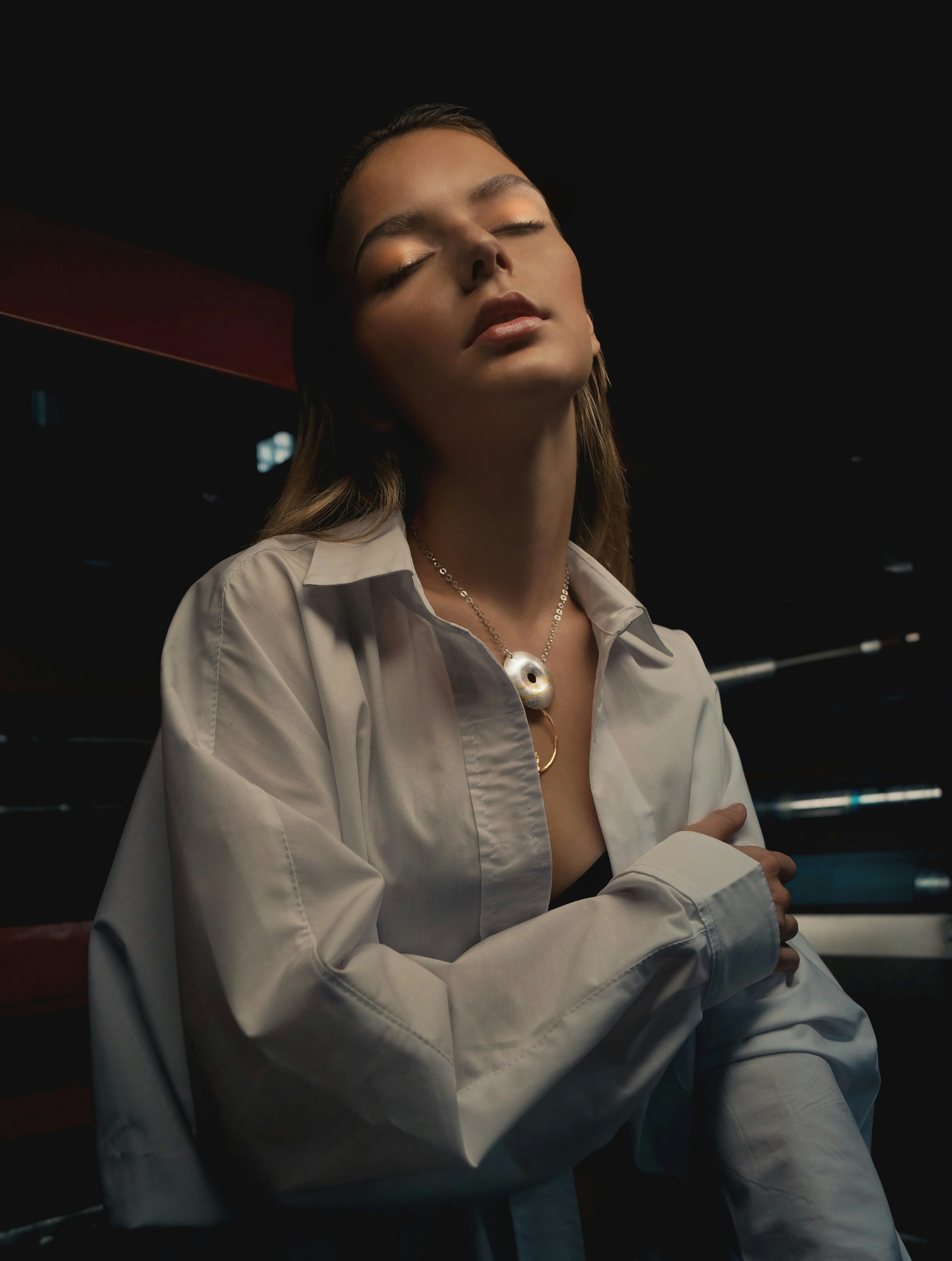 woman touching her left arm