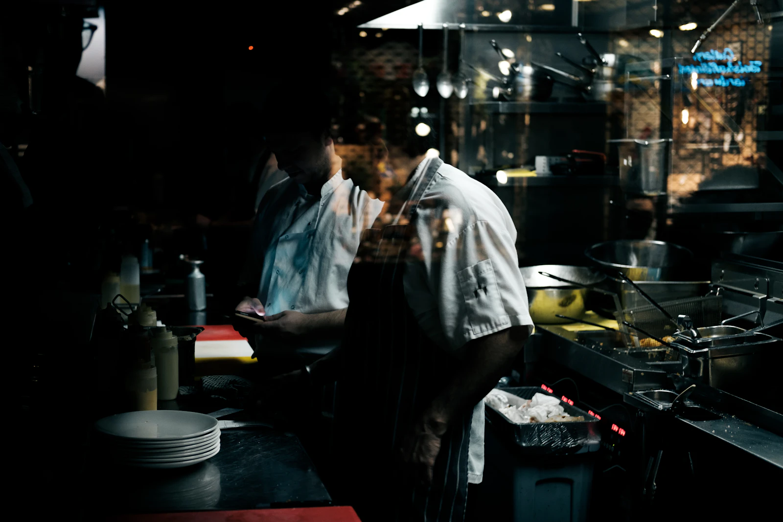 A restaurant kitchen team working a busy service