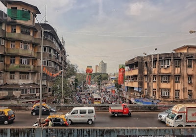 vehicle on road during daytime mumbai google meet background