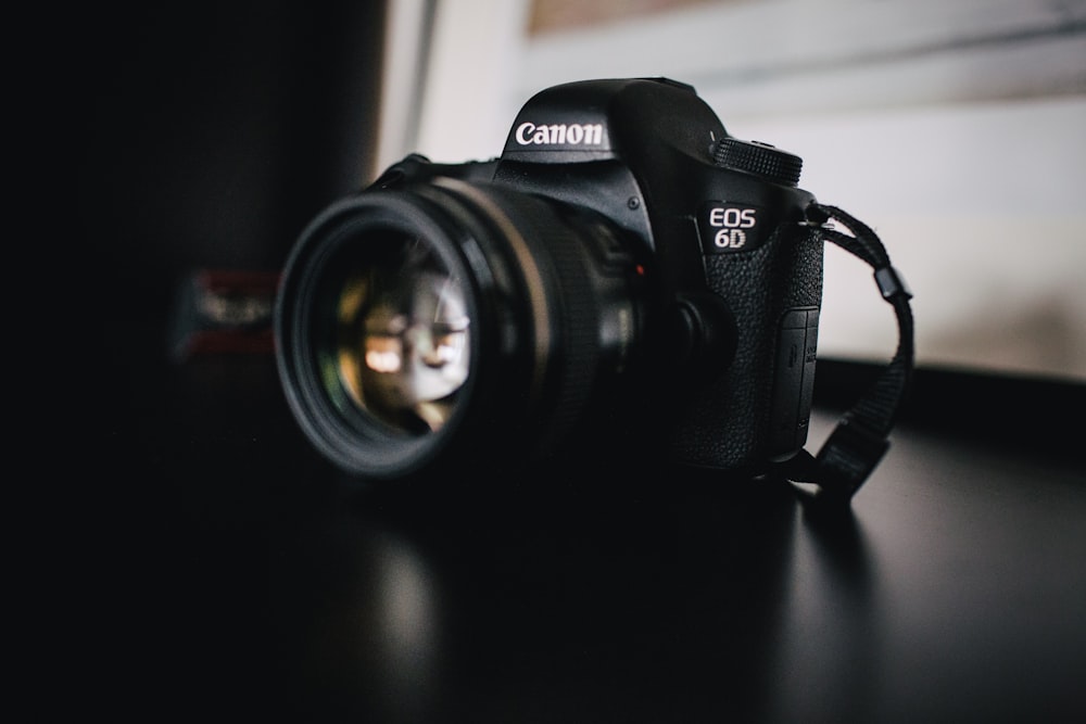 selective focus photography of black Canon EOS 6D