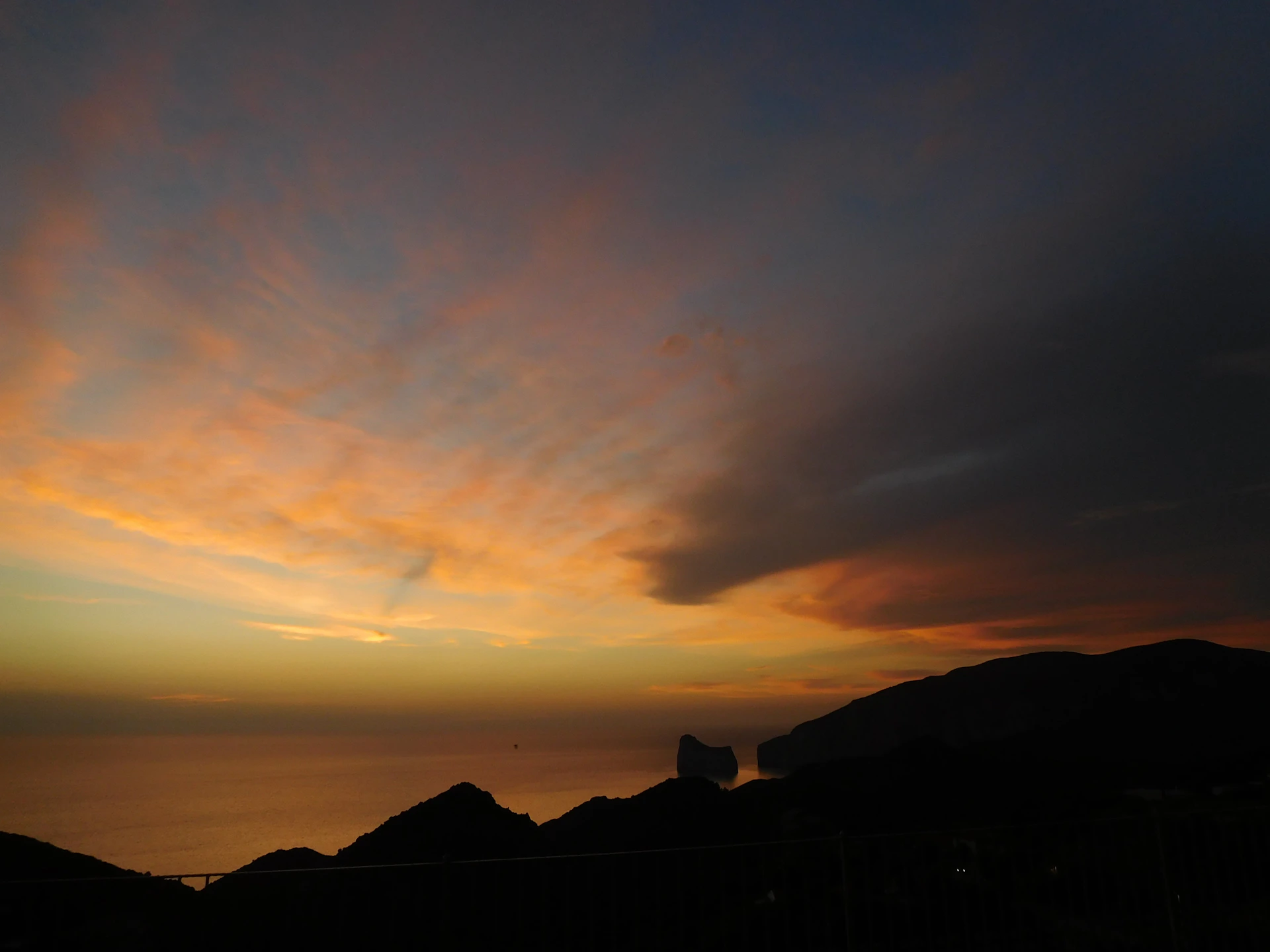 woman wearing yellow long-sleeved dress under white clouds and blue sky during daytime