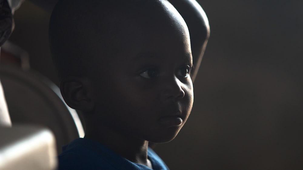 close up photography of boy