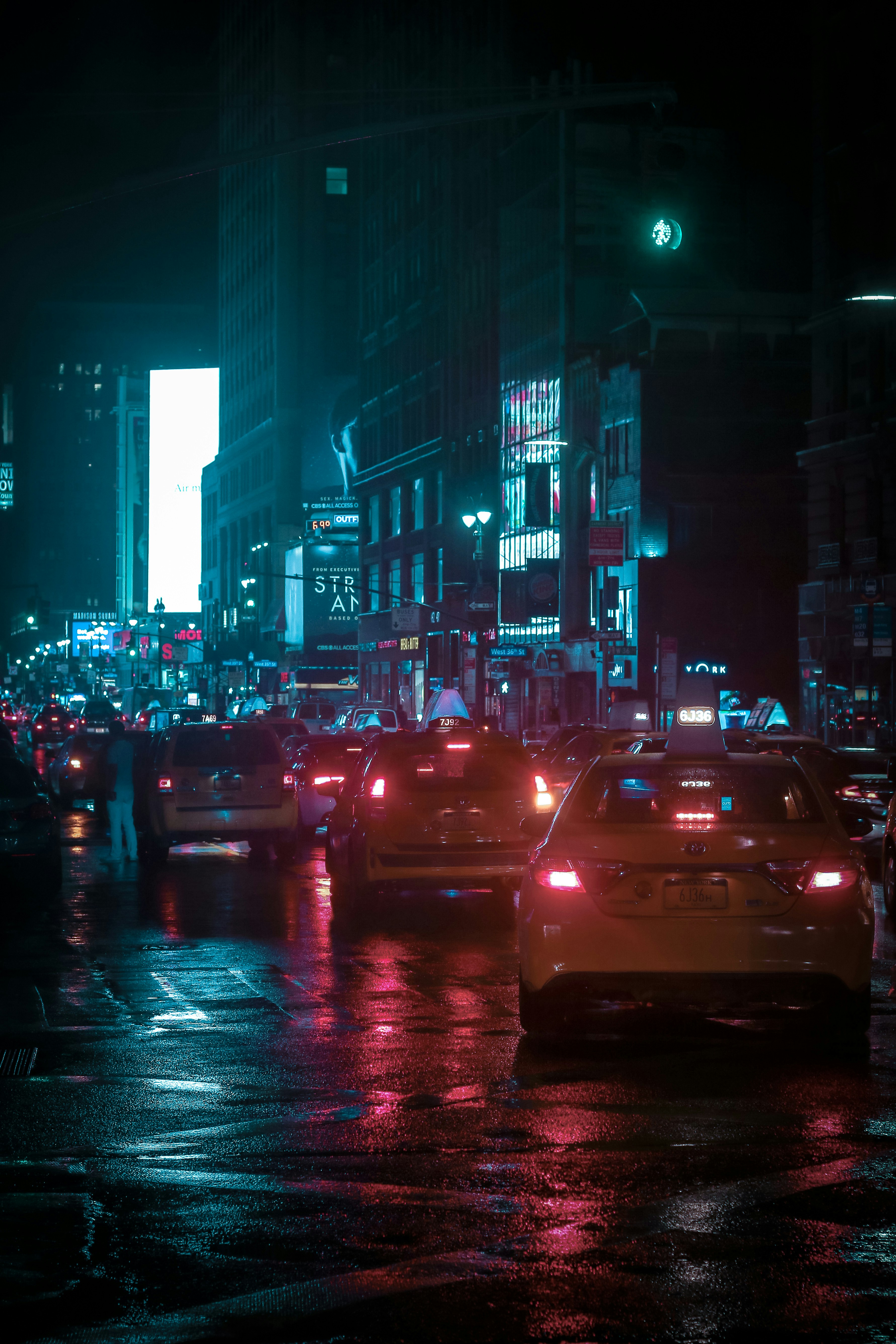 vehicles travelling on road during nighttime