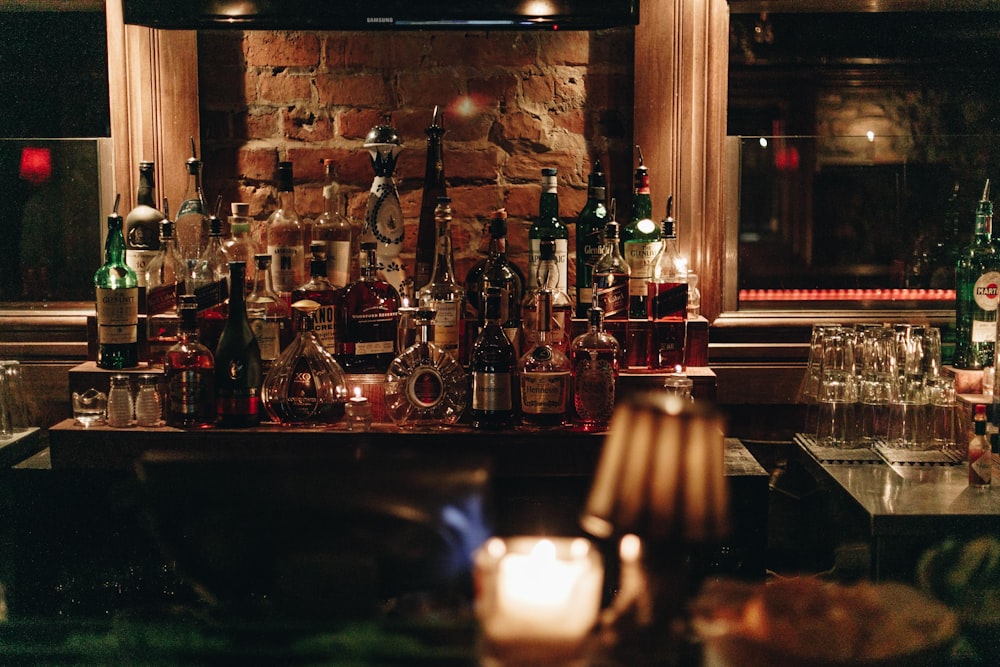 assorted wine bottles in bar